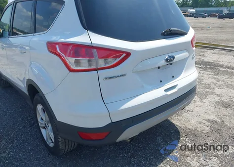 2014 Ford Escape Se z USA, uszkodzony, nr VIN 1FMCU9GX9EUC61521